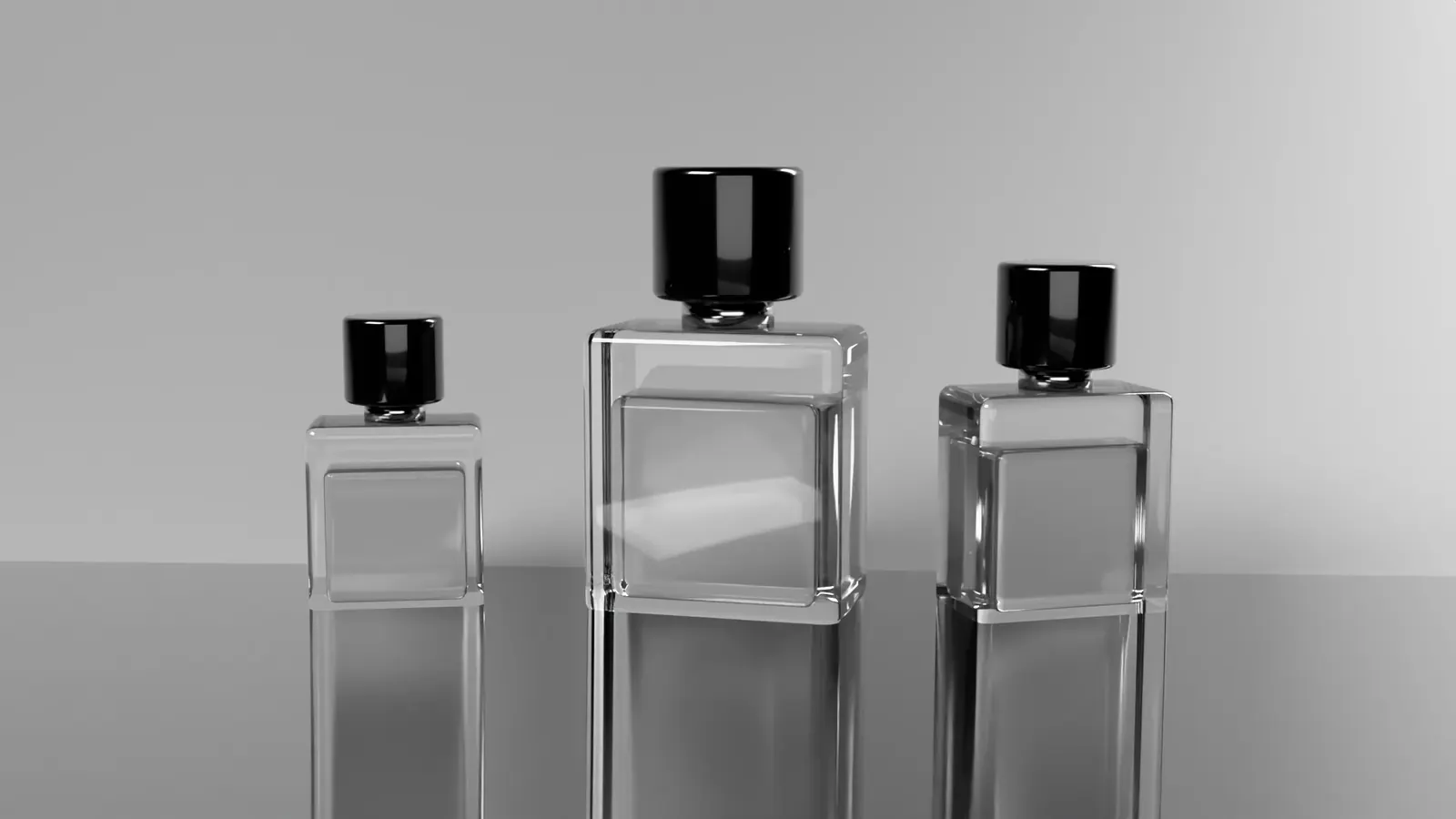 Three Bloom Hours bottles in different sizes on a mirrored floor