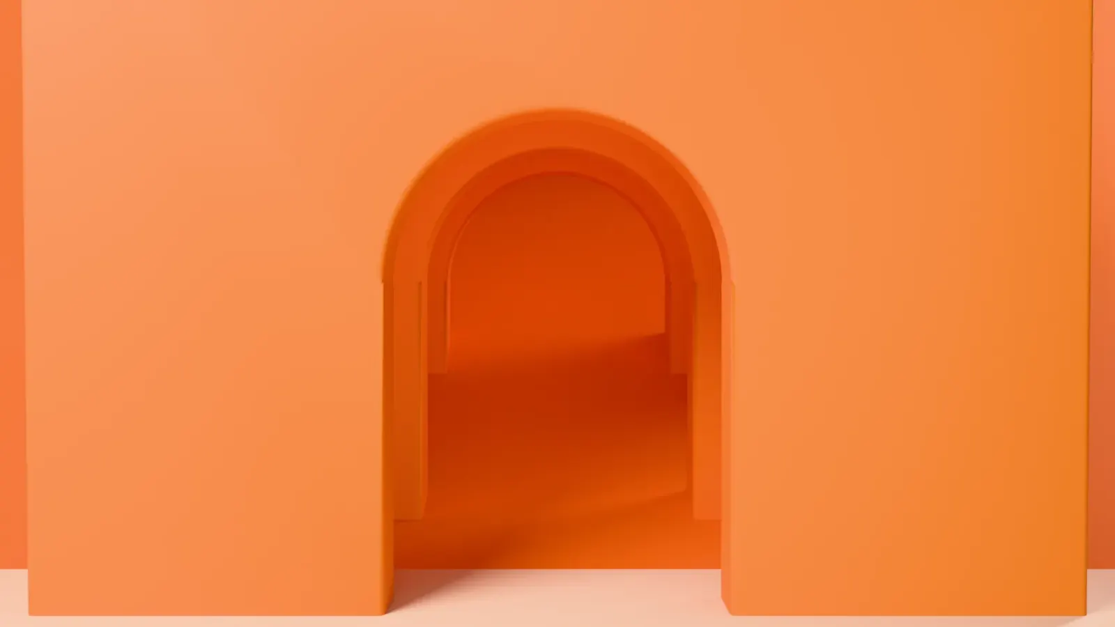 A corridor of orange Orbit Labs arches receding into soft light